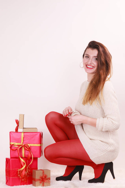 Woman with many christmas gift boxes - Foto, Imagen