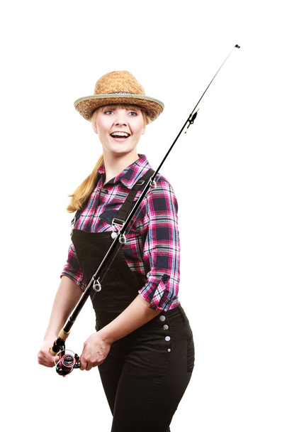 Woman holding fishing rod looking at float - Valokuva, kuva