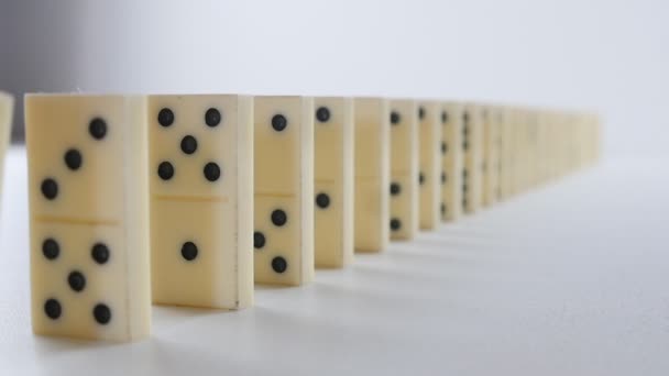 White Dominoes Falling in Chain Reaction. Domino Effect - Footage, Video