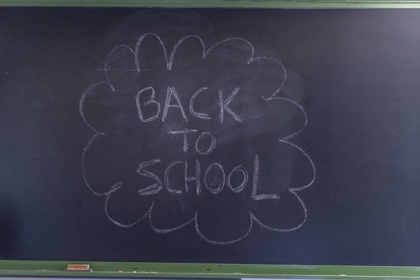 Back to school written on a blackboard - Foto, Imagem