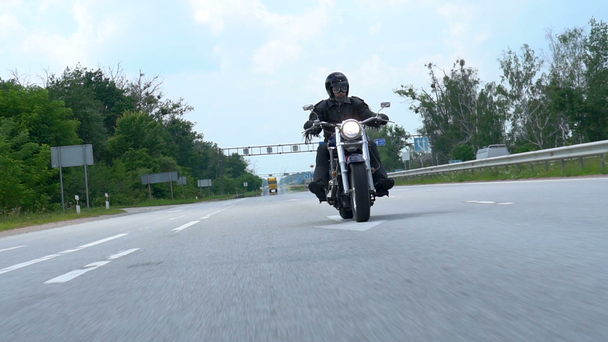 Motorcyclist on a country road - Footage, Video