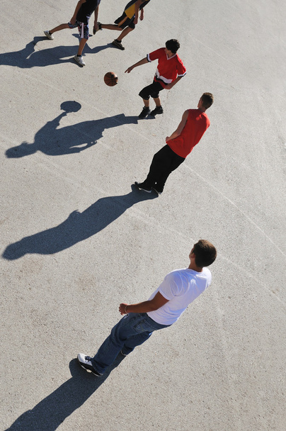 Street basketball, playing basketball outdoor - Fotó, kép
