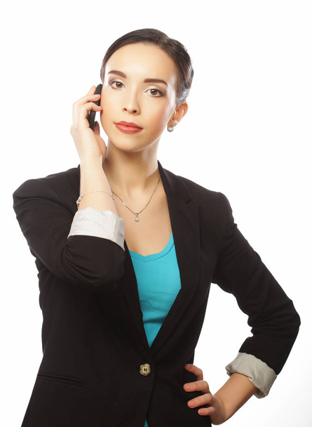 Young business woman with mobile phone - Φωτογραφία, εικόνα