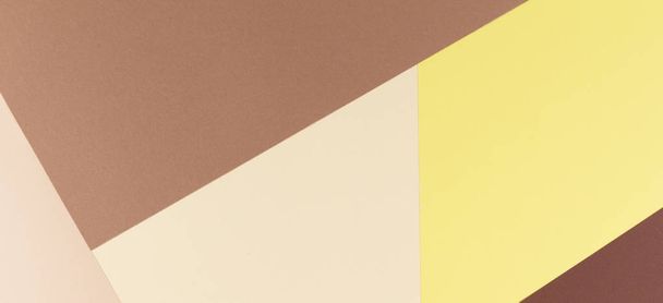 Renkli yumuşak kahverengi, bej ve sarı kağıt arka plan. - Fotoğraf, Görsel