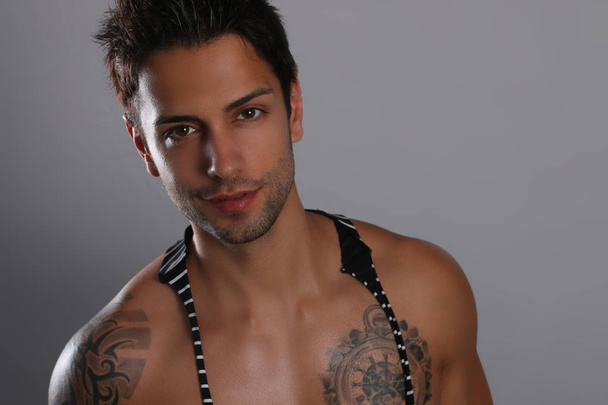 Gorgeous tattooed male model - Photo, image