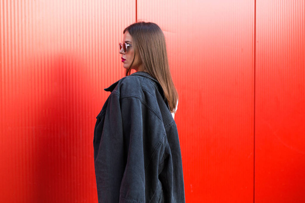 Woman with black denim jacket - Fotó, kép