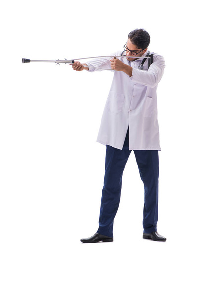 Nuori lääkäri seisoo kävely eristetty valkoinen backgr - Valokuva, kuva