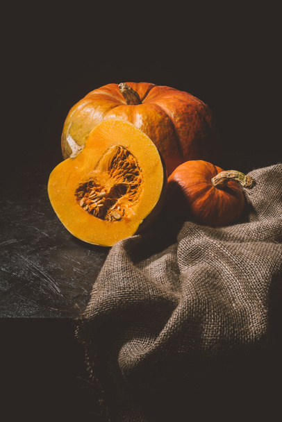ripe pumpkins on sackcloth  - Photo, Image
