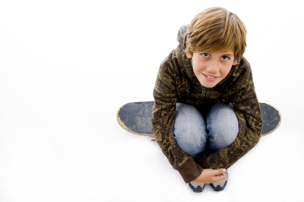 High angle view of boy on skateboard - 写真・画像