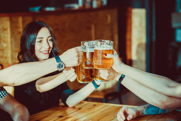 Happy Friends Drinking Beer - Фото, зображення