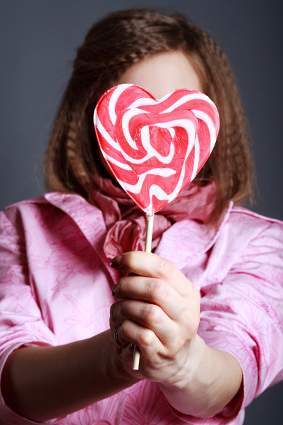 Beautiful girl with big lollipops - Photo, image