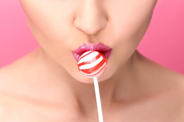 young woman with lollipop - Foto, Imagen