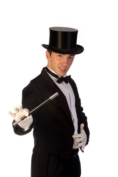 Young magician performing with wand - Foto, Imagem