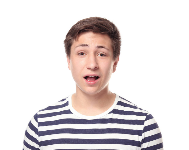 Cute teenager boy posing on white background - Фото, изображение