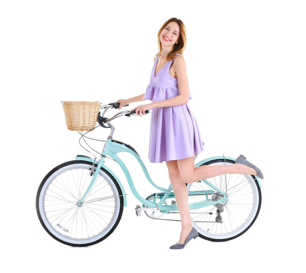 Young smiling girl with bicycle  - Photo, Image