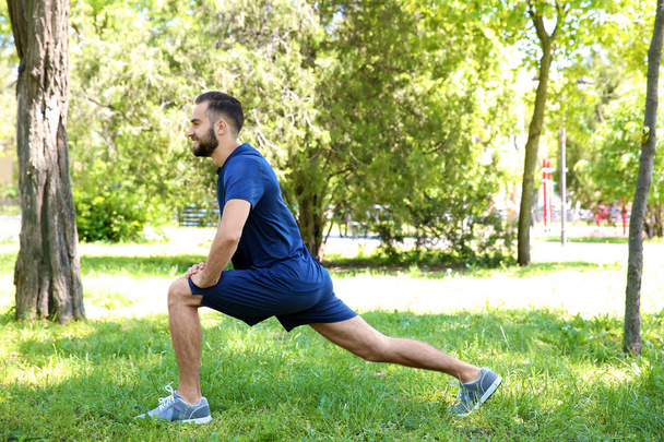 man doing sport exercises for legs - Foto, Bild