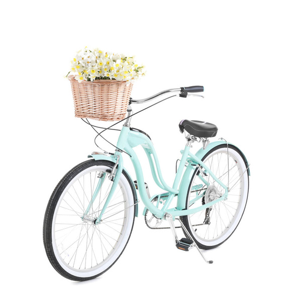 Bicycle with basket of beautiful flowers  - Фото, зображення