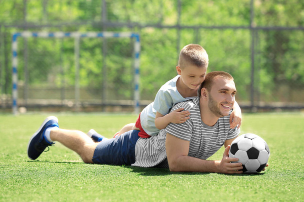 Father and son with ball - Photo, image
