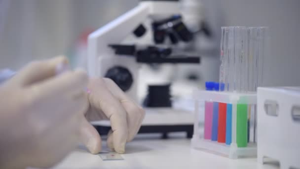Scaled up look on chemical substance test in lab - Felvétel, videó