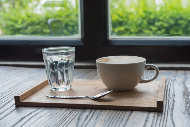 coffee cup on wooden table - Foto, Imagen