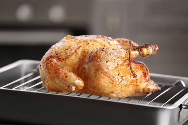 Delicious golden turkey on baking tray - Fotó, kép