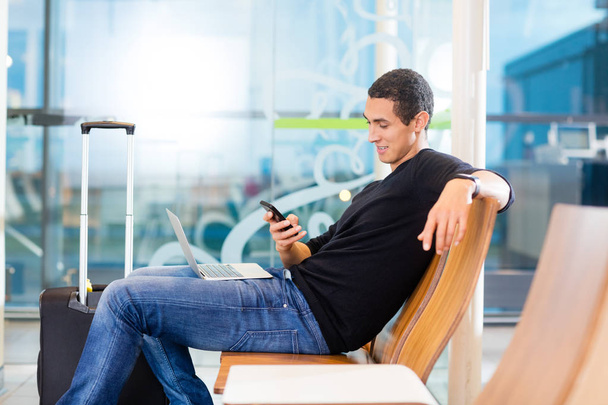 Man Using Smartphone In Airport Waiting Area - Photo, Image