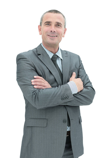 Happy mature man in suit smiling while standing against white - Photo, Image