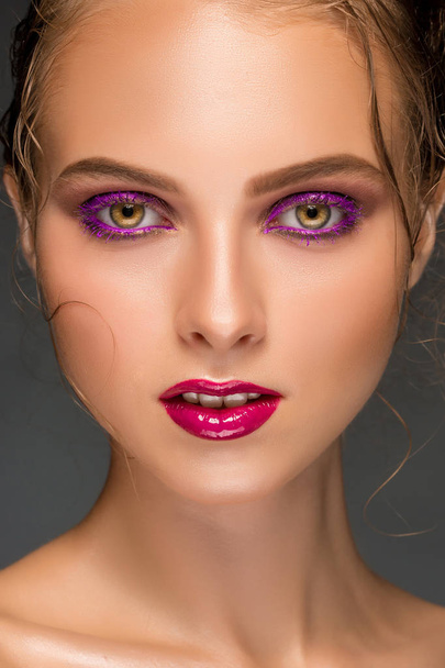 Beauty woman face closeup isolated on black background. Beautiful - Foto, afbeelding