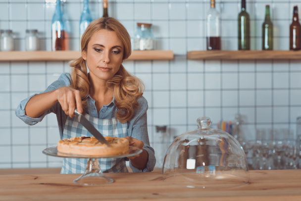 waitress cutting pie - Photo, Image