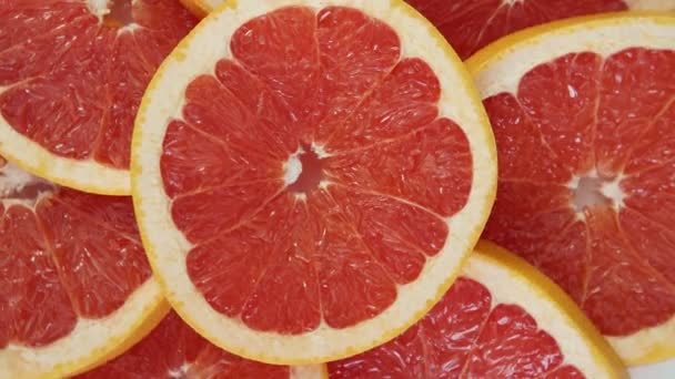 Sliced grapefruit background - Filmmaterial, Video