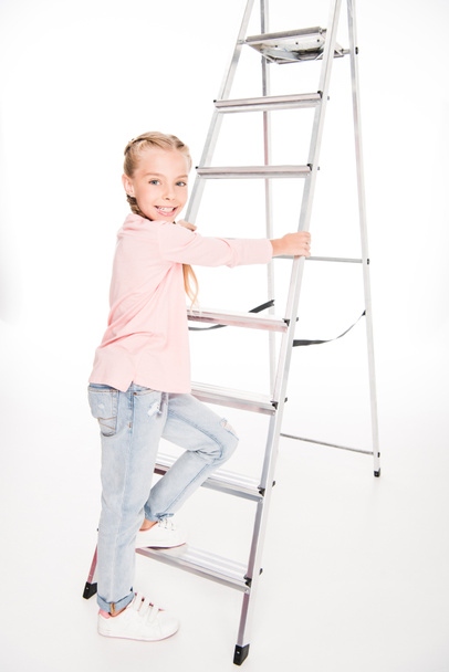 kid with metal ladder - Foto, Imagen