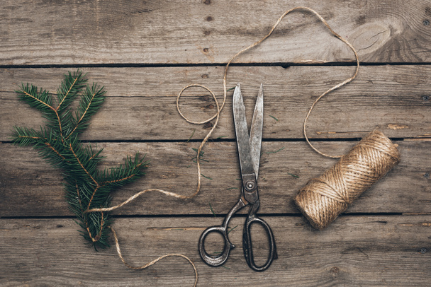 fir, scissors and twine for Christmas decorations - Foto, Imagem