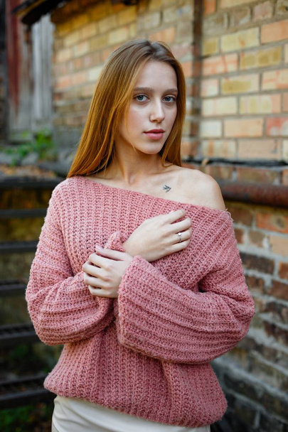 attractive woman in pink sweater - Photo, image