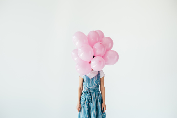 donna e palloncini rosa
 - Foto, immagini