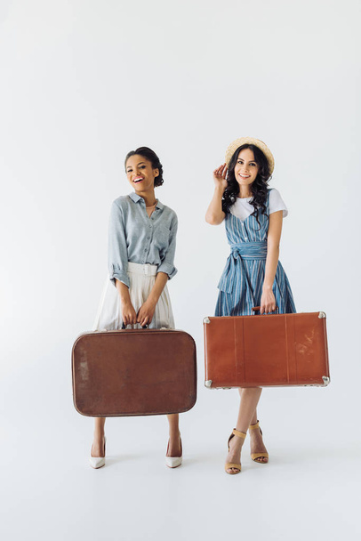 multiethnic women with luggage - Φωτογραφία, εικόνα