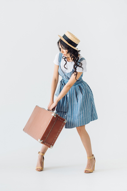 woman with retro suitcase - Foto, afbeelding