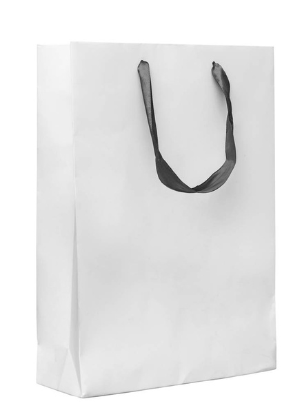 Big white paper bag with satin ribbon handles  - Photo, Image
