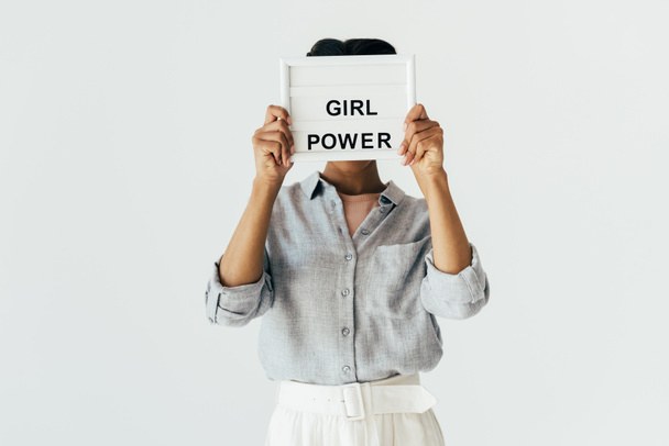 mulher americana africana com placa do poder da menina
 - Foto, Imagem