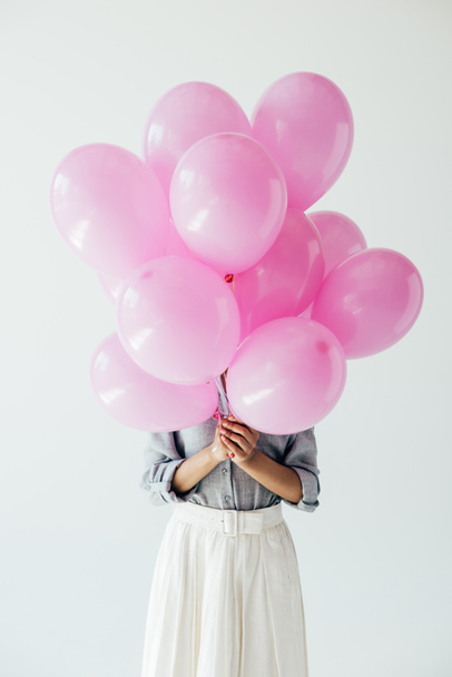 vrouw bedrijf ballonnen - Foto, afbeelding