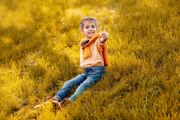 child showing thumb up - Photo, Image