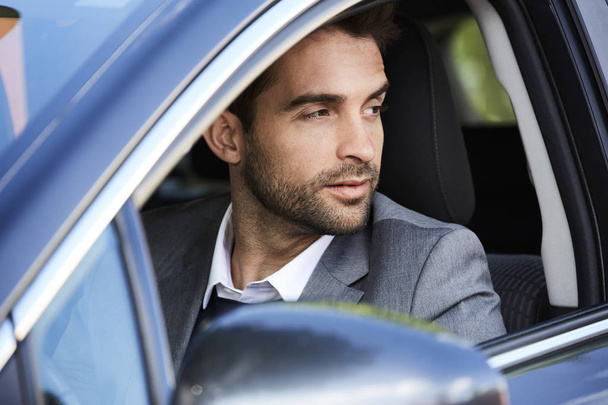 handsome man sitting in car  - Photo, Image
