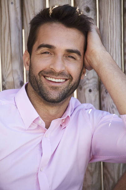 Happy guy in pink shirt  - Zdjęcie, obraz