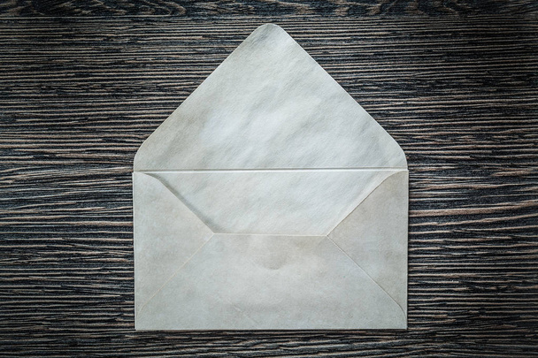 Vintage envelope on black board - Photo, image