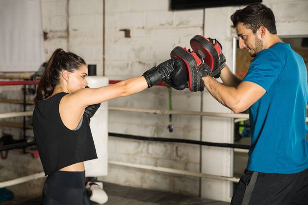 Boxer training with her coach - Foto, immagini