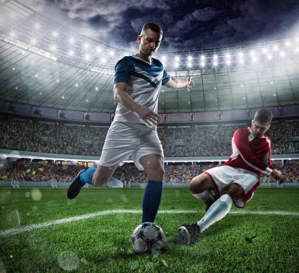 Scena di calcio con i giocatori di calcio concorrenti allo stadio - Foto, immagini