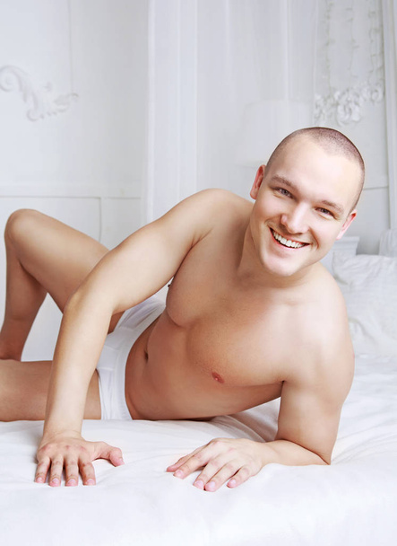 man in bed - Fotografie, Obrázek
