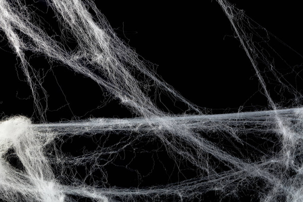 Overlay cobwebs against black - Foto, immagini