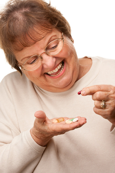 Attractive Senior Woman and Medication Pills - Foto, Imagen