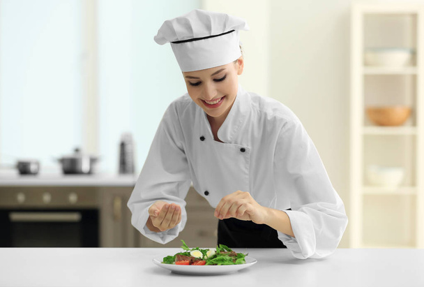 Young female chef  - Фото, зображення