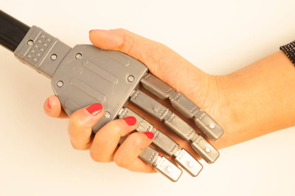 girl and robot handshake - Photo, Image